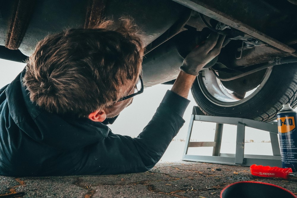 The bottom of a car being worked on