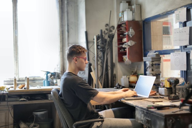 A man buying a targeted mailing list at a computer