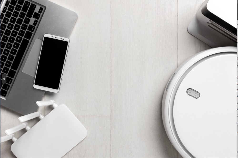 Various electronics on a white desk